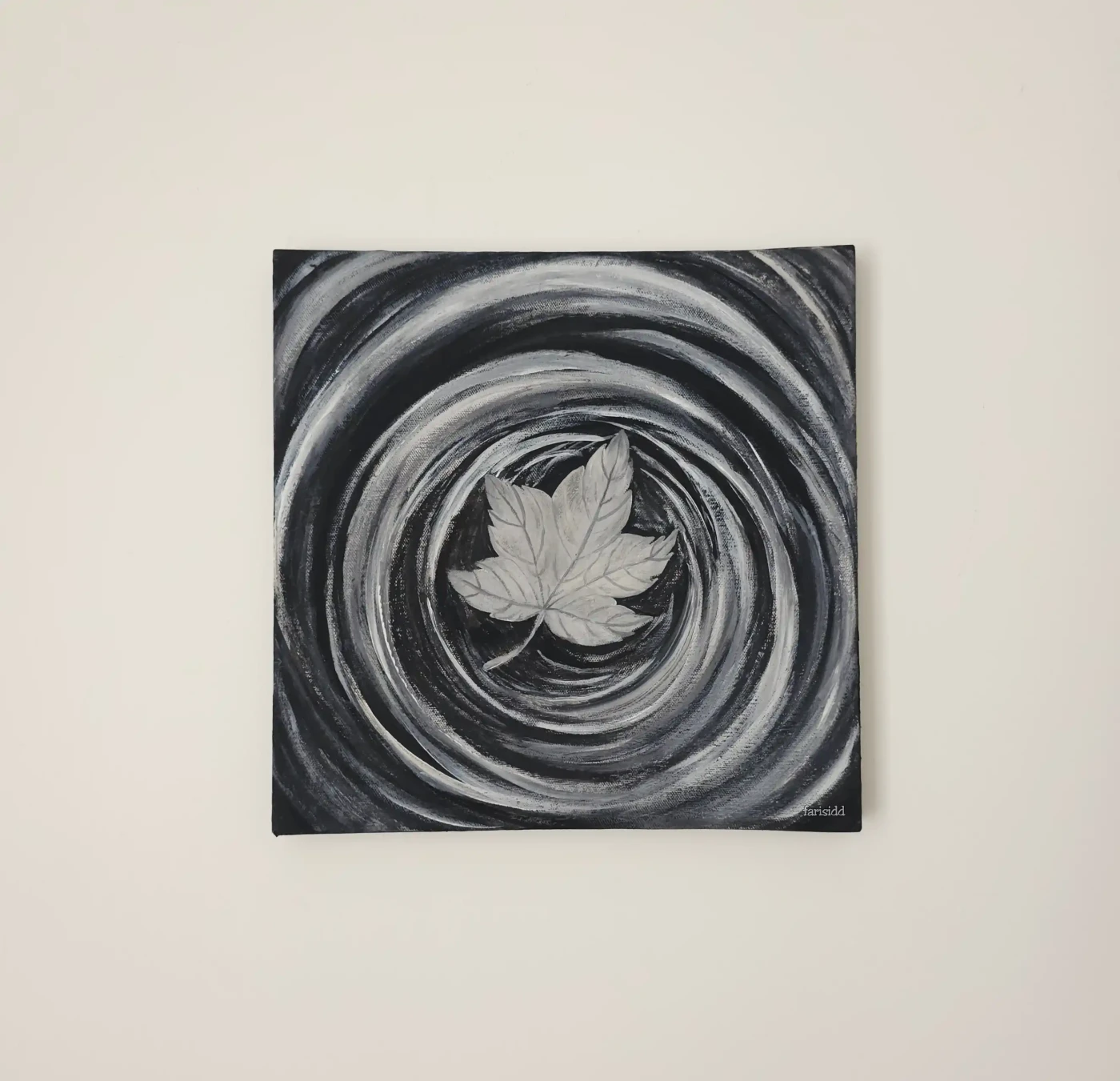 Monochrome Ripple: A Leaf’s Journey